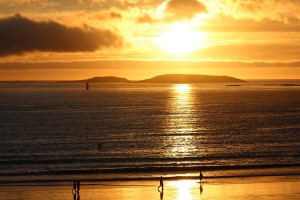 El sol sobre el mar de playa América Panxón atardecer verano autor Manuel Ramallo